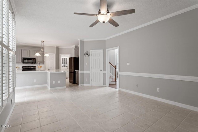 unfurnished living room with light tile patterned flooring, ceiling fan with notable chandelier, sink, ornamental molding, and a textured ceiling