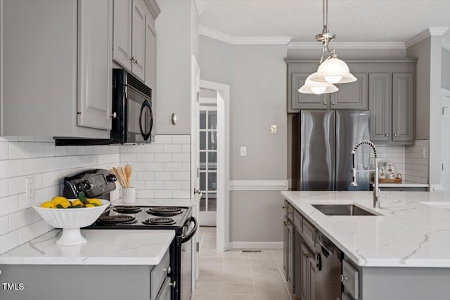 kitchen with gray cabinets, crown molding, light stone countertops, and black appliances