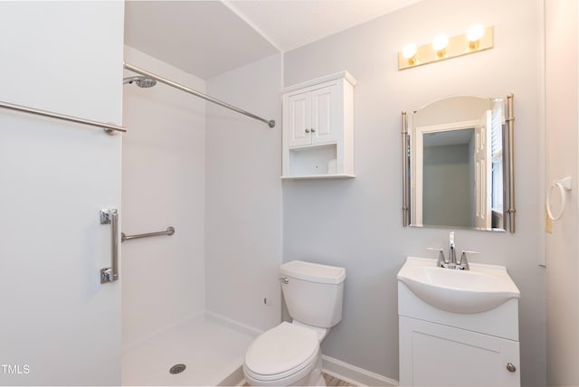 full bath with vanity, toilet, and walk in shower