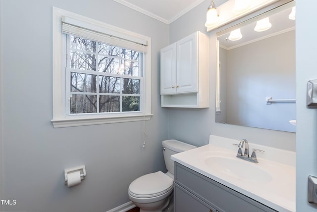 half bath featuring toilet, ornamental molding, and vanity