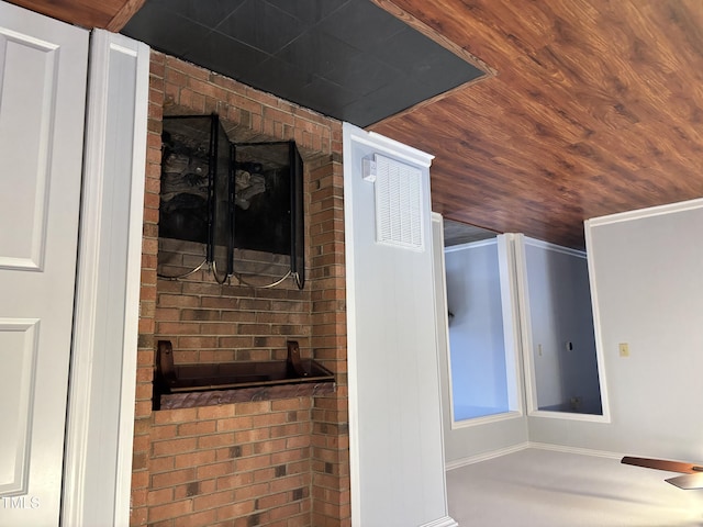 bathroom with wood ceiling and visible vents