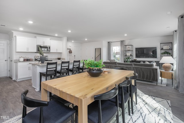 dining room featuring light hardwood / wood-style flooring