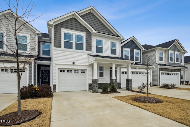 view of front of home with a garage and covered porch