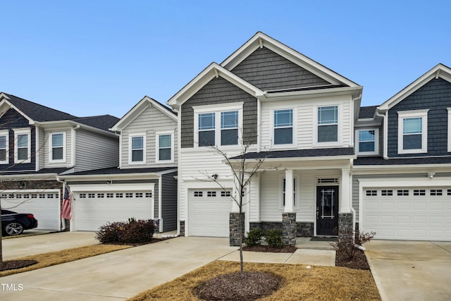 view of front of property featuring a garage and a porch