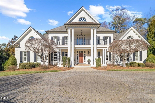 neoclassical / greek revival house with a balcony