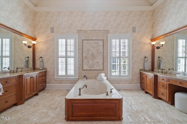 full bathroom featuring ornamental molding, two vanities, plenty of natural light, and wallpapered walls