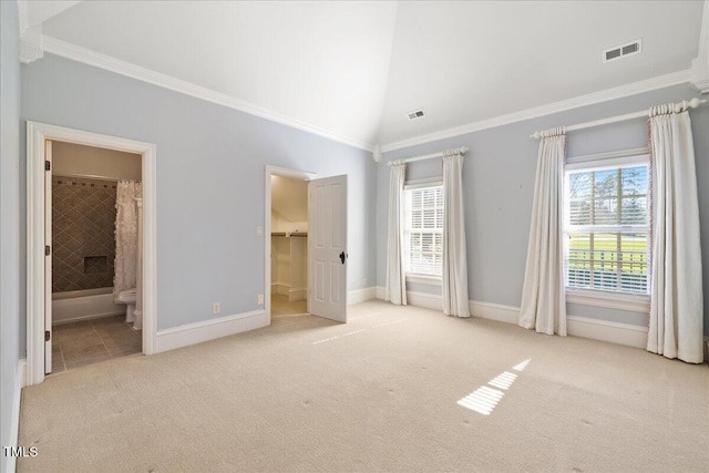 unfurnished bedroom with light carpet, multiple windows, visible vents, and crown molding