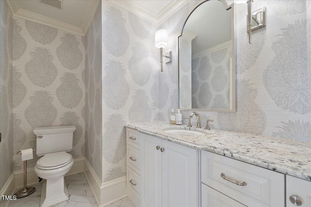 bathroom featuring toilet, visible vents, baseboards, vanity, and wallpapered walls