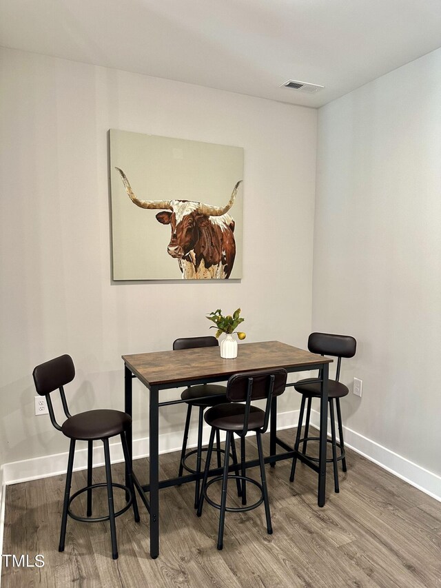 dining room featuring hardwood / wood-style floors