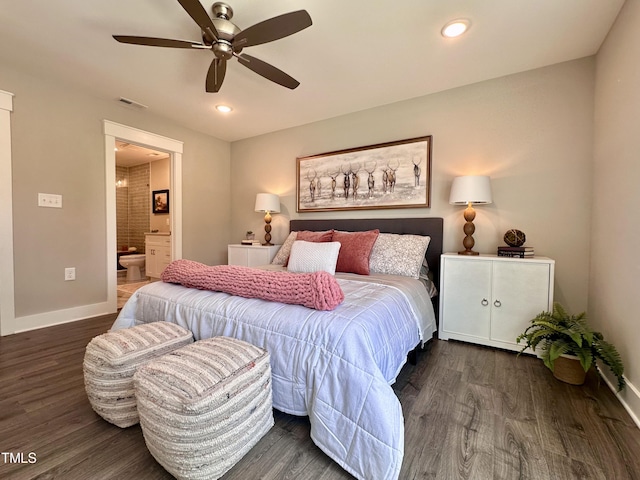 bedroom with dark hardwood / wood-style flooring, connected bathroom, and ceiling fan