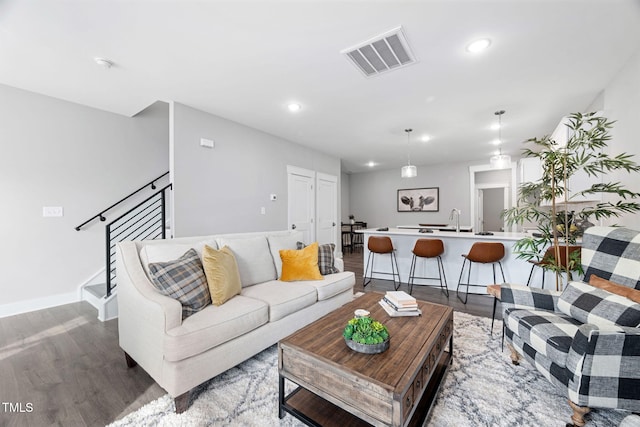 living room with hardwood / wood-style floors