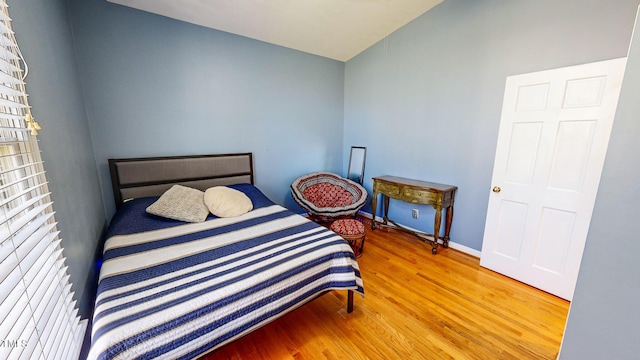 bedroom featuring hardwood / wood-style flooring