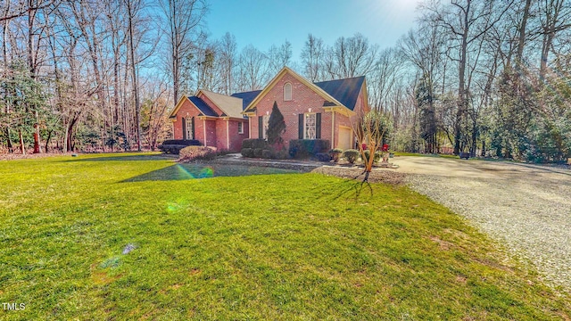 view of front property with a garage and a front lawn