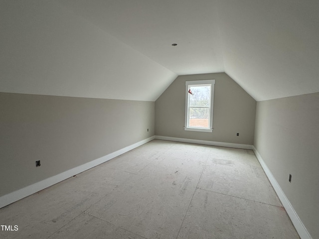 bonus room featuring vaulted ceiling