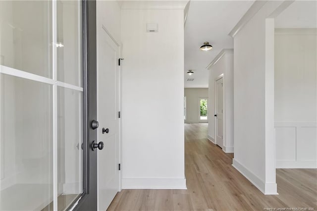 5210 Maxwell Rd, Stedman, NC 28391 - corridor with light wood finished floors and baseboards