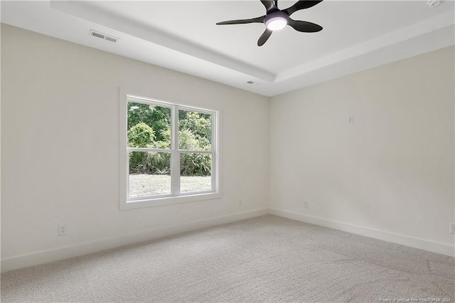 5210 Maxwell Rd, Stedman, NC 28391 - empty room with a tray ceiling, light carpet, baseboards, and ceiling fan