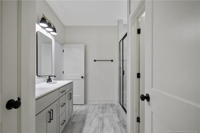 5210 Maxwell Rd, Stedman, NC 28391 - bathroom featuring marble finish floors, a stall shower, double vanity, and baseboards