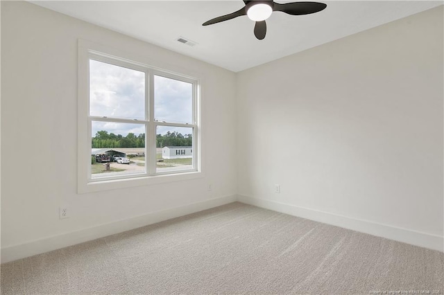 5210 Maxwell Rd, Stedman, NC 28391 - empty room featuring light colored carpet, baseboards, and a ceiling fan