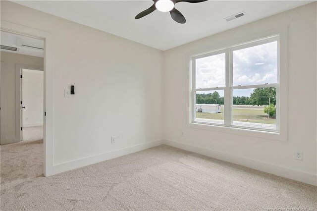 5210 Maxwell Rd, Stedman, NC 28391 - spare room featuring carpet, a ceiling fan, plenty of natural light, and baseboards