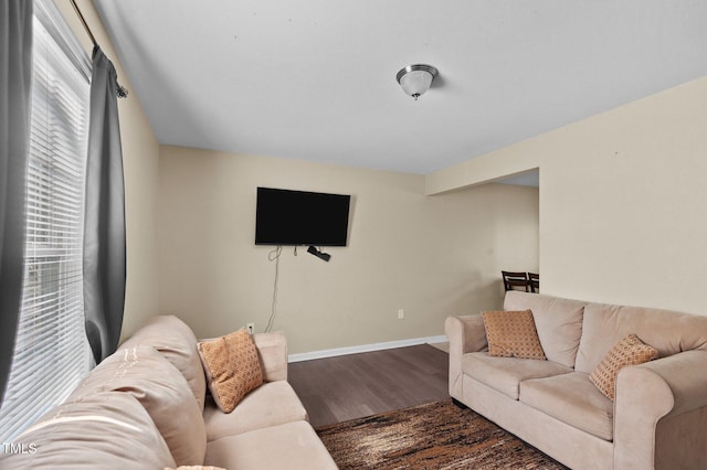 living room with dark hardwood / wood-style floors