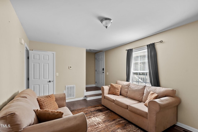 living room featuring dark hardwood / wood-style floors