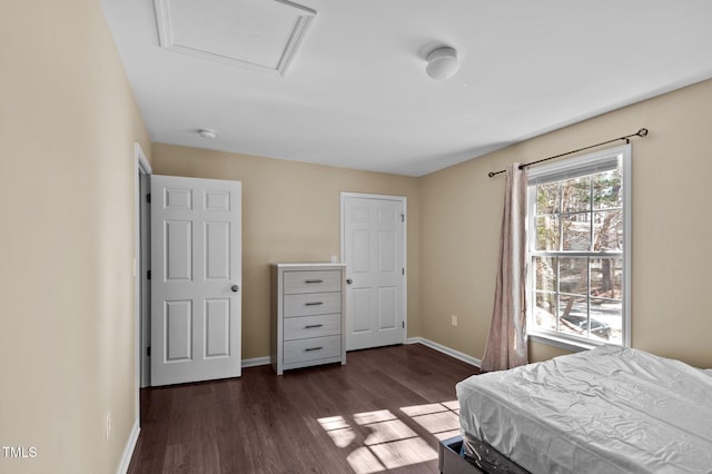 bedroom featuring dark hardwood / wood-style floors