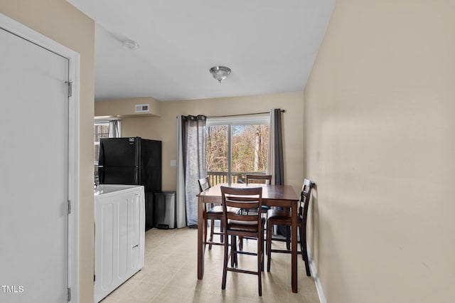 dining area with washer / dryer