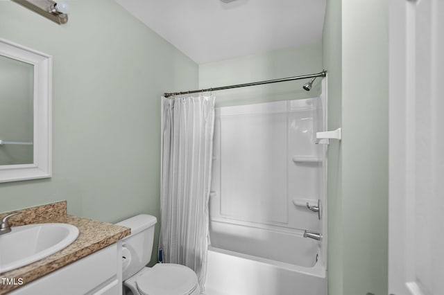 full bathroom with vanity, toilet, and shower / tub combo with curtain