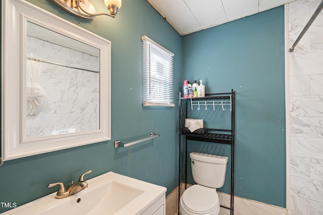 bathroom featuring sink and toilet