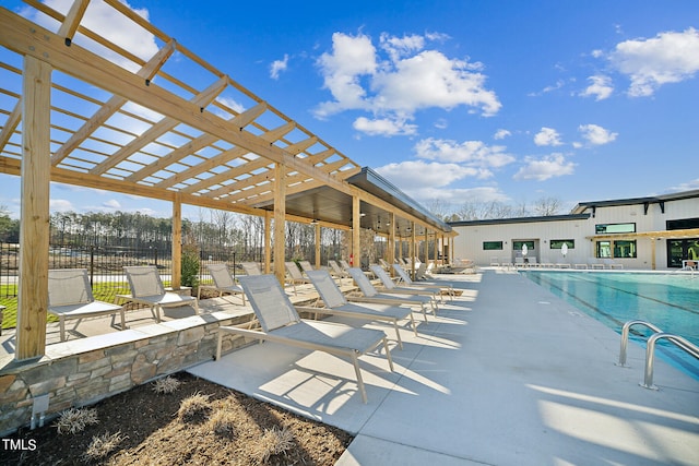 view of pool featuring a patio and a pergola