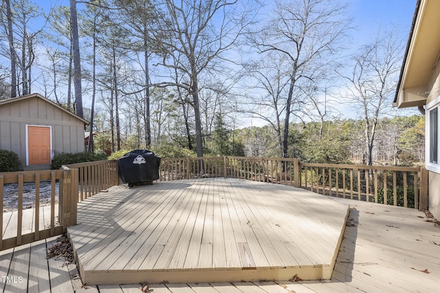 wooden deck with a storage unit