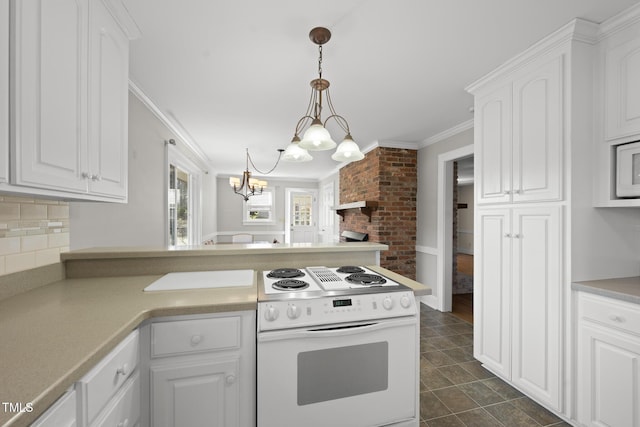 kitchen with hanging light fixtures, crown molding, white electric stove, and white cabinets