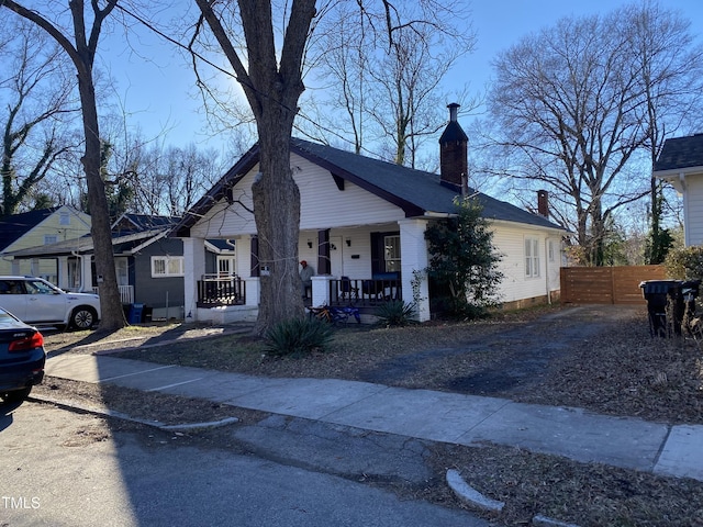 ranch-style house with covered porch