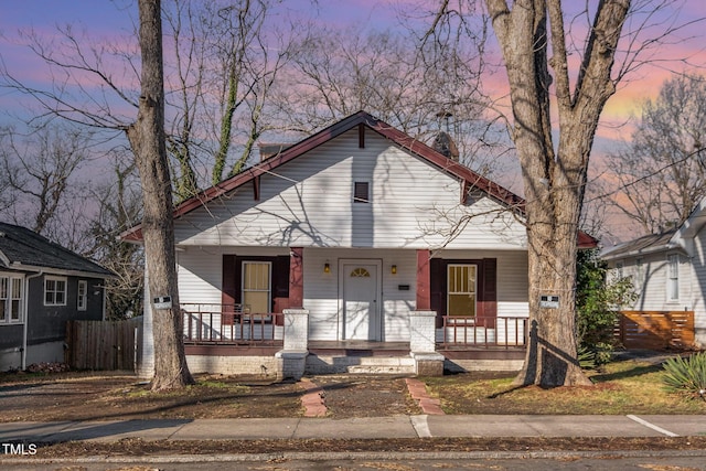 bungalow-style home with covered porch