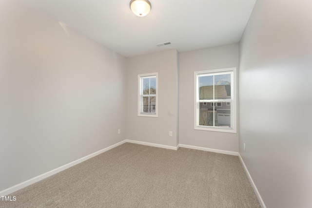 view of carpeted spare room