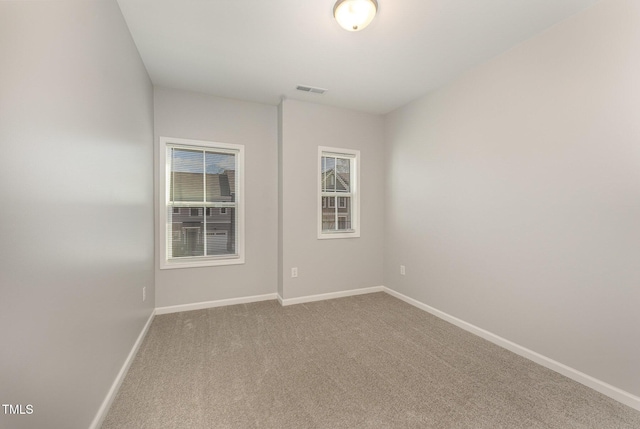 view of carpeted spare room