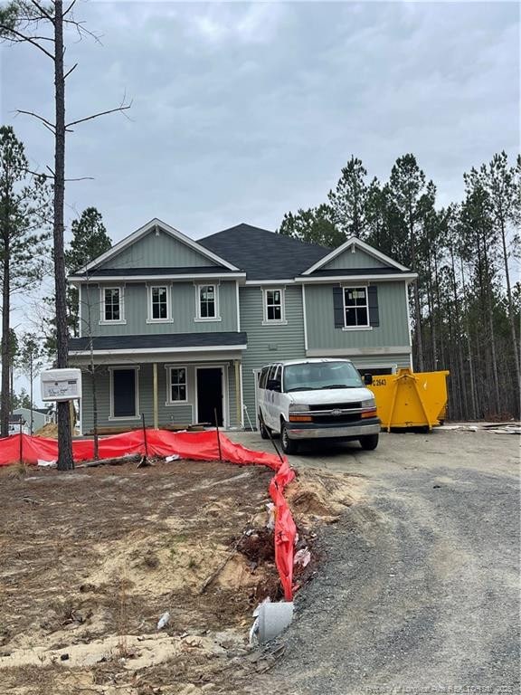 view of front of property featuring driveway