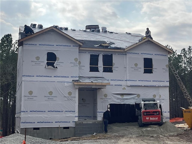 property under construction with a garage