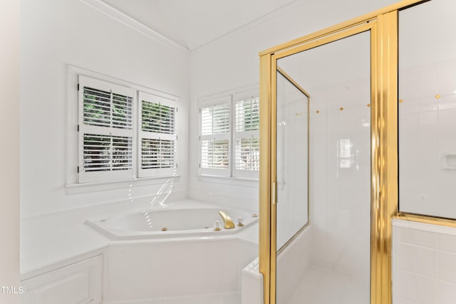 full bathroom featuring a tub with jets, a stall shower, and crown molding