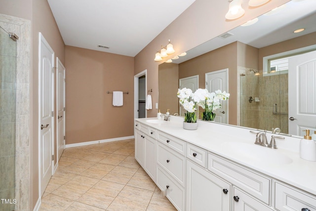 full bathroom with a stall shower, visible vents, and a sink