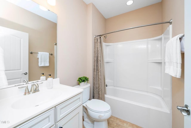 bathroom featuring vanity, shower / bath combination with curtain, toilet, and tile patterned floors