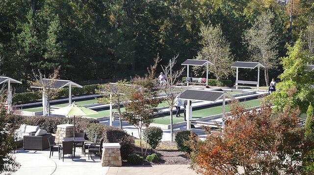 view of home's community featuring a wooded view