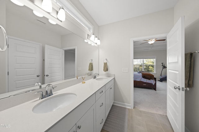 bathroom featuring vanity, tile patterned floors, and ceiling fan