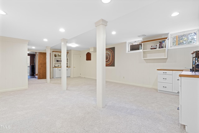 basement with light carpet