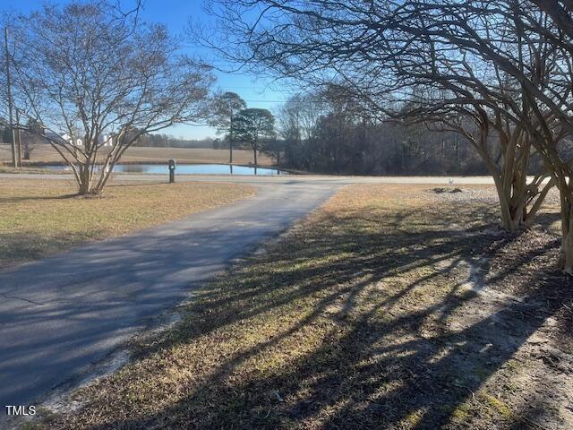 view of road featuring a water view