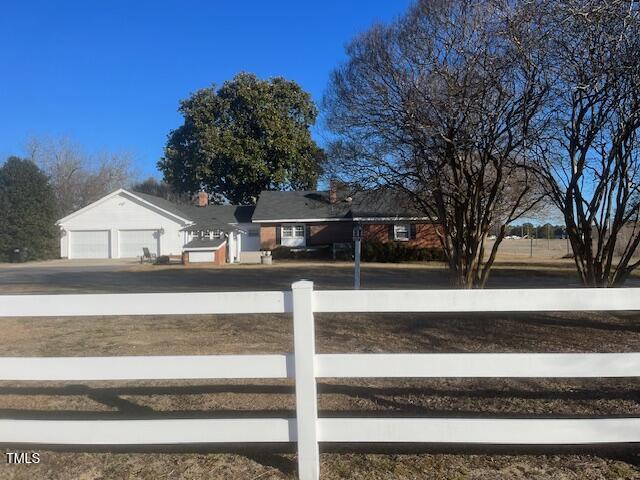 view of yard with a garage