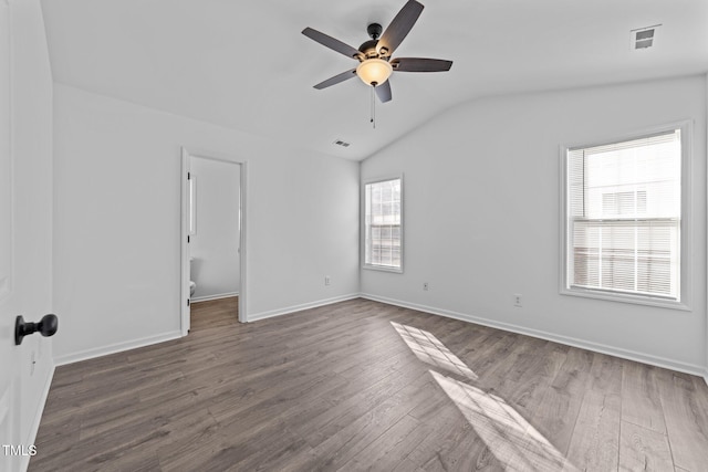 interior space with lofted ceiling, dark wood-type flooring, and ceiling fan