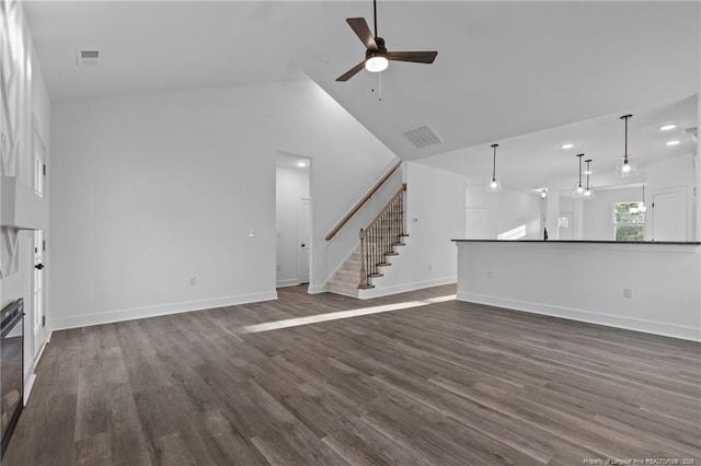 531 Southerland Peak, Raeford, NC 28376 - unfurnished living room with a ceiling fan, visible vents, high vaulted ceiling, and dark wood-type flooring