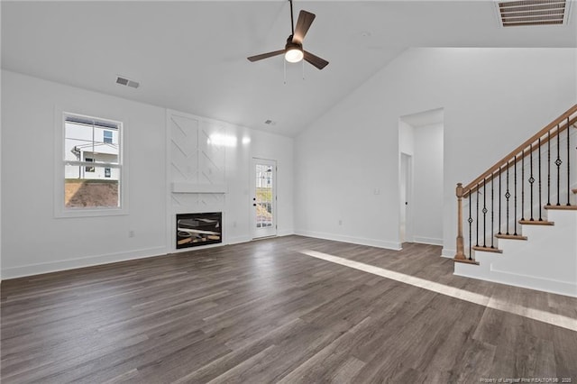 531 Southerland Peak, Raeford, NC 28376 - unfurnished living room with a fireplace, visible vents, a ceiling fan, and dark wood-style floors