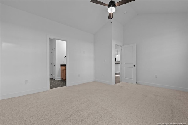 531 Southerland Peak, Raeford, NC 28376 - unfurnished bedroom featuring high vaulted ceiling, carpet floors, ensuite bathroom, and baseboards